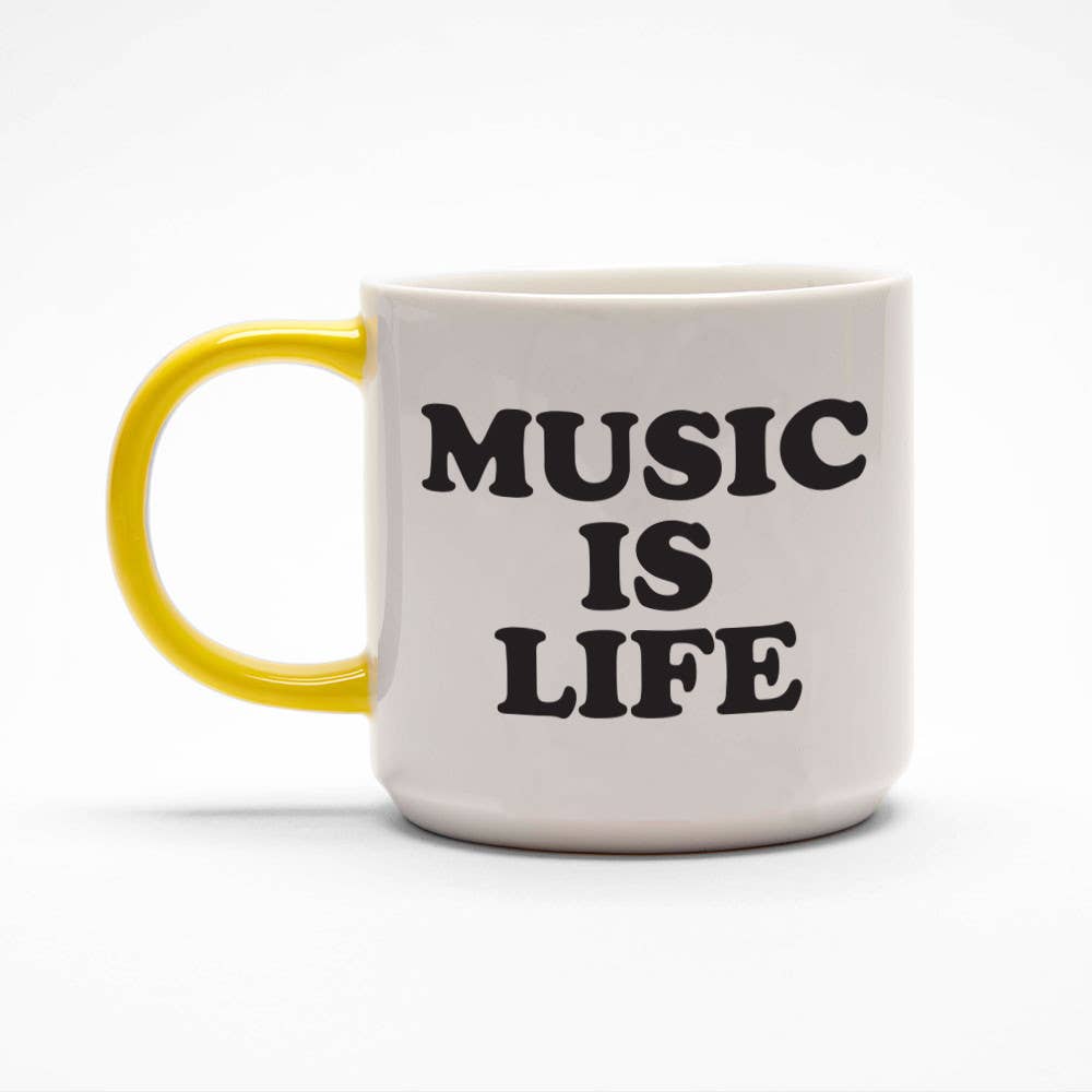 Ceramic mug with the phrase "Music Is Life" in bold black letters on a white background and a yellow handle.