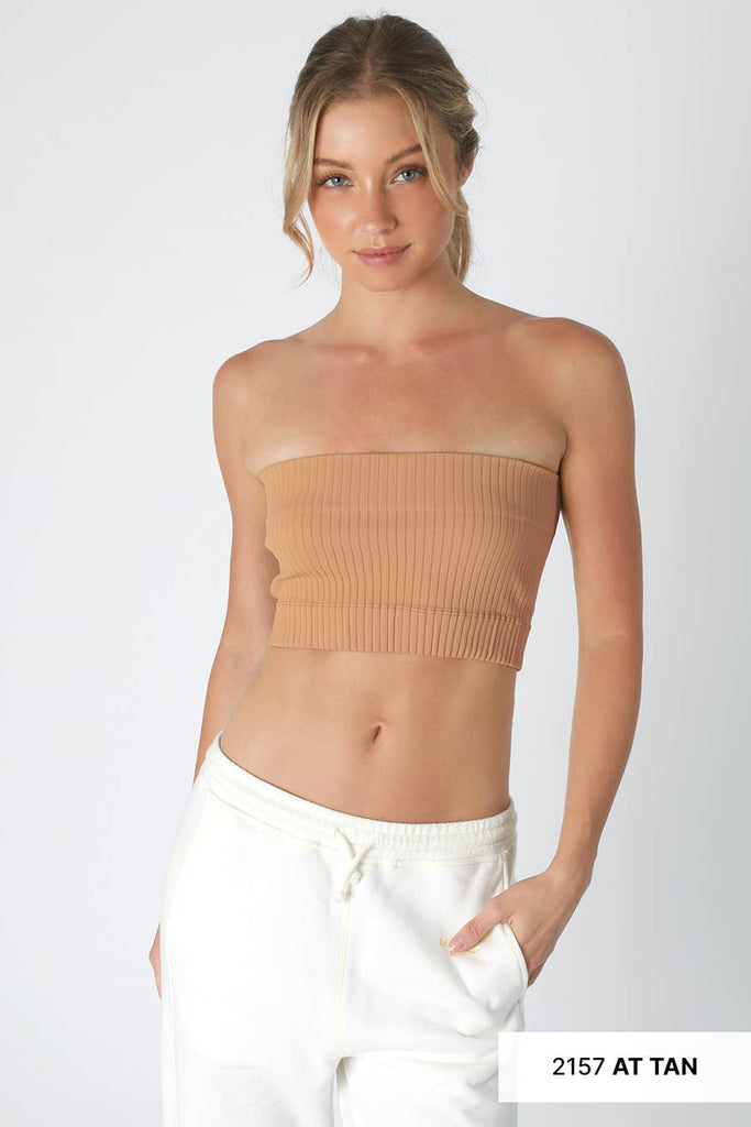 Woman wearing Radiance Ribbed Bandeau Top in a bright yellow color, featuring a comfortable, stretchy ribbed fabric.