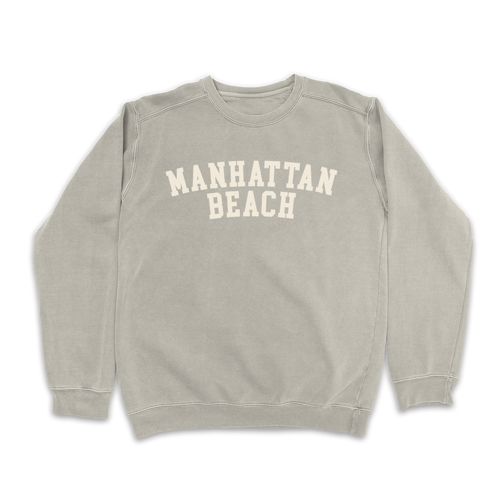 Neutral gray "Manhattan Beach" sweatshirt with white text on a plain white background.