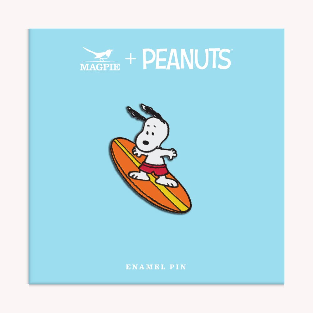 Enamel pin of Snoopy surfing on an orange surfboard.