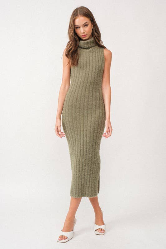 Woman wearing a sleeveless white turtle neck rib-knit midi dress.