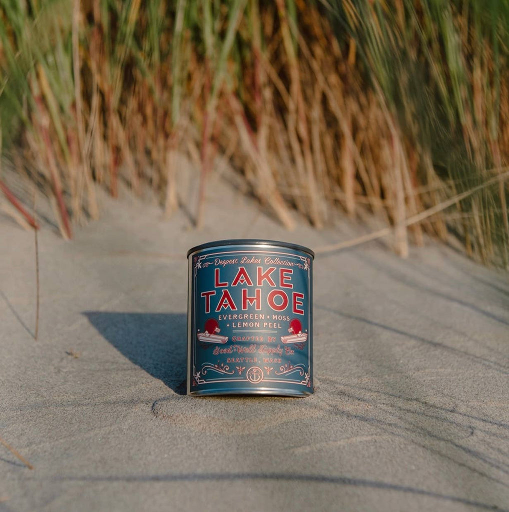 Lake Tahoe Candle: Handcrafted organic soy wax candle emitting a serene glow, epitome of natural tranquility.