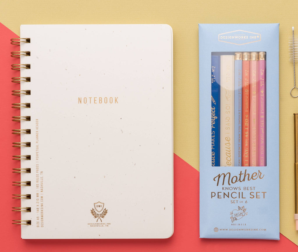 "Mother Knows Best" pencil set of six colorful pencils with mom-inspired quotes, packaged in a light blue box.