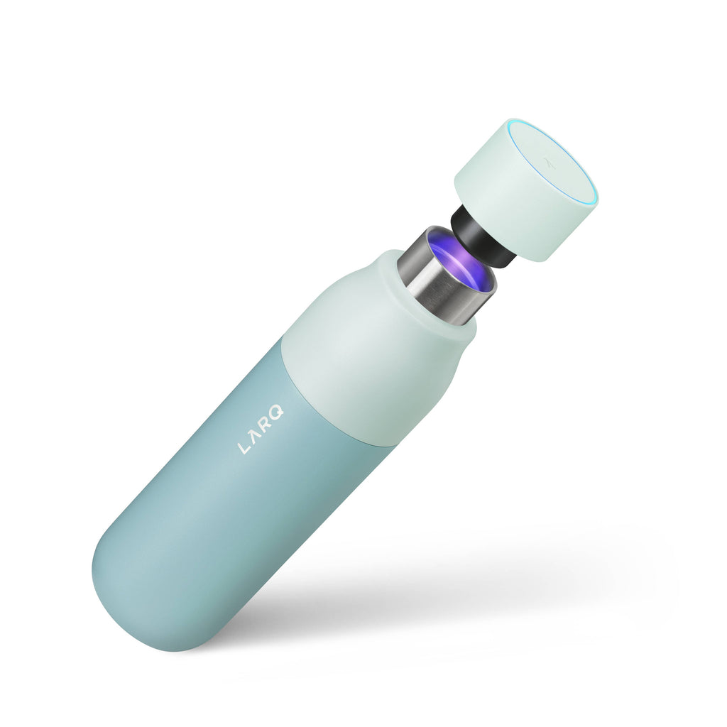LARQ Mint water bottle with UV-C cap light activated, shown on a white background.