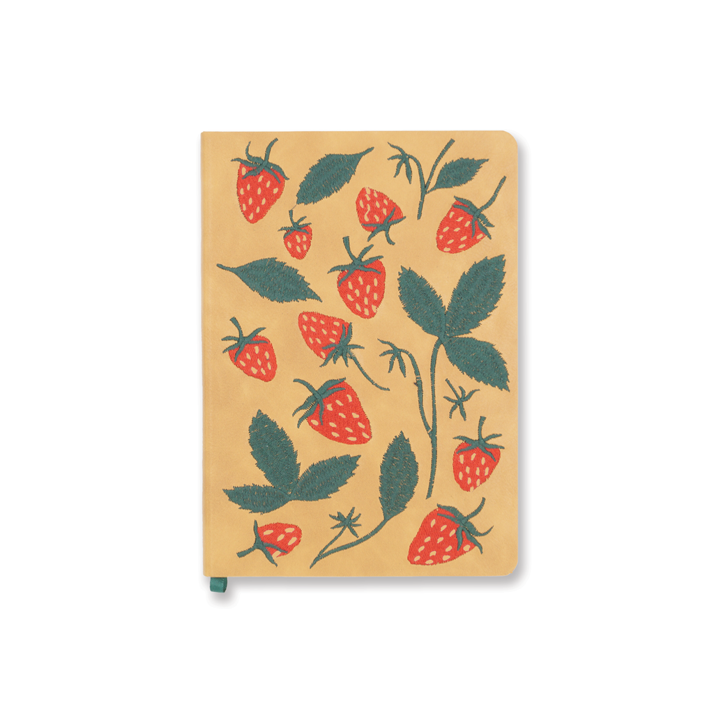 Embroidered journal with a strawberry design, featuring high-quality paper and durable binding, placed on a wooden table.