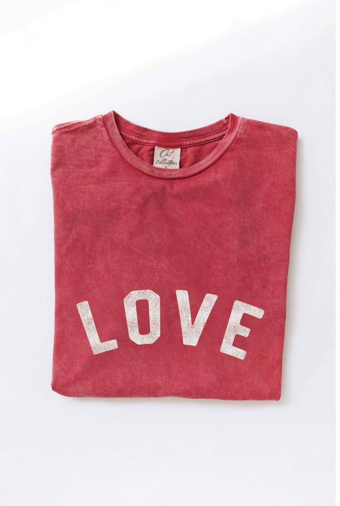 Ivory "LOVE" graphic t-shirt with bold red vintage-style lettering, made from soft cotton for a relaxed and comfortable fit.