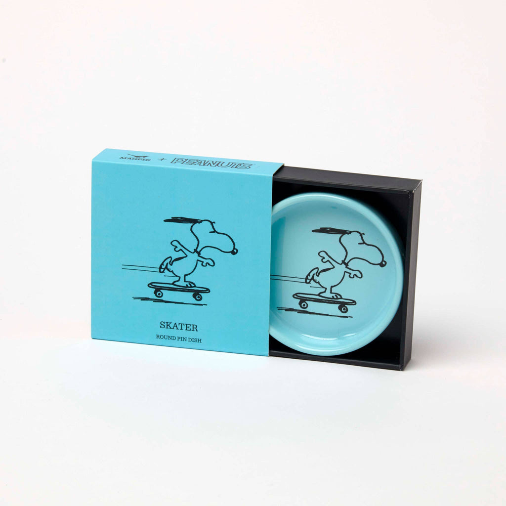 Blue Snoopy pin dish with a skateboarding Snoopy illustration.