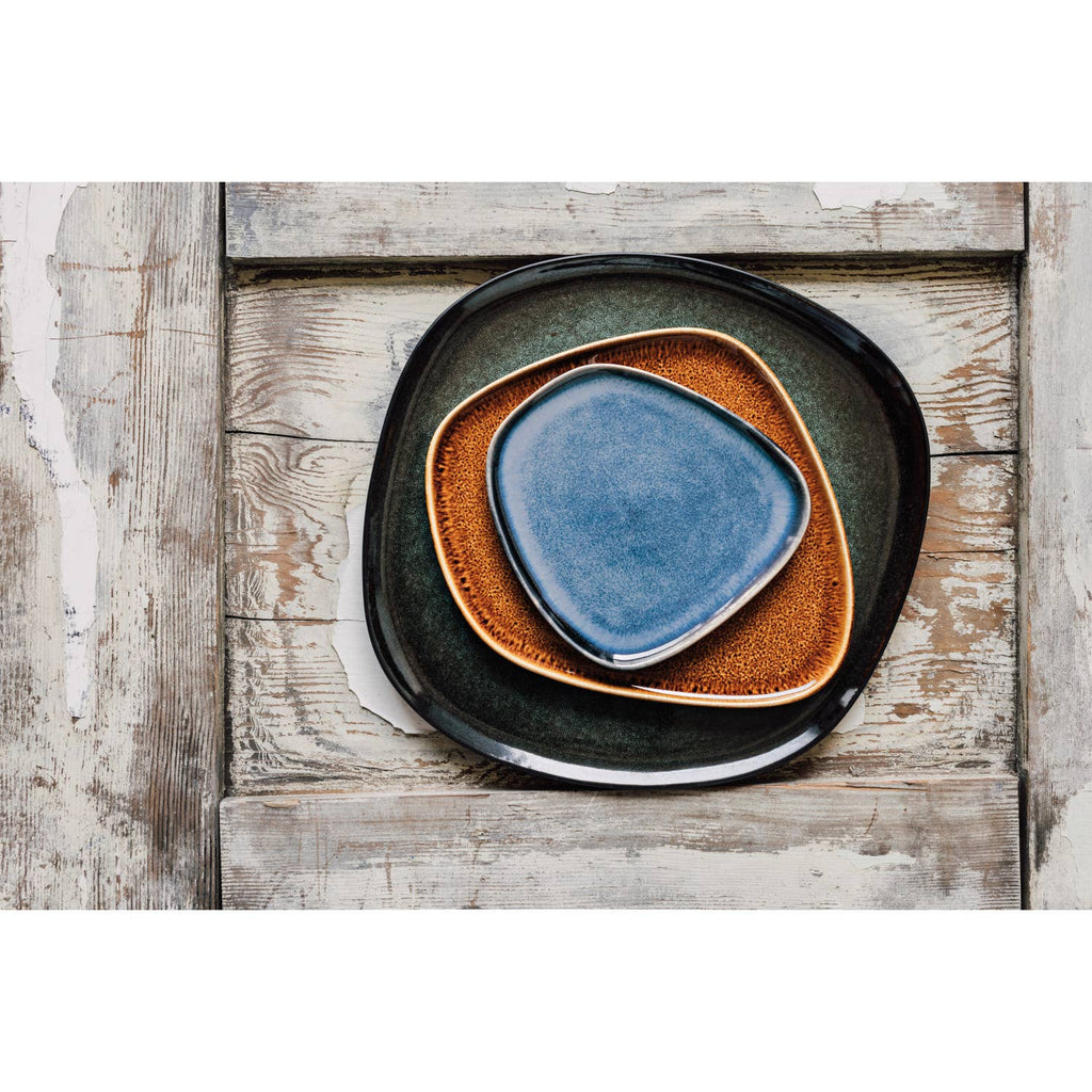 Tumble Plate with a smooth, polished surface in warm, earthy tones, inspired by the natural beauty of tumbled stones.