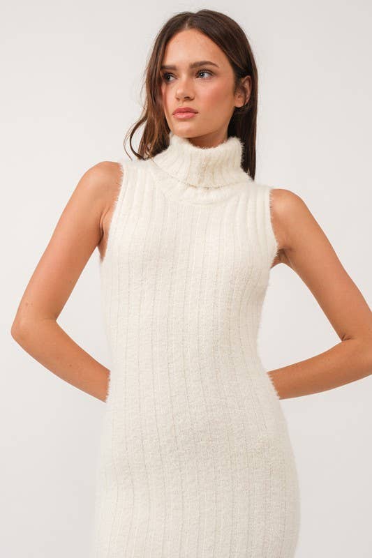 Woman wearing a sleeveless white turtle neck rib-knit midi dress.