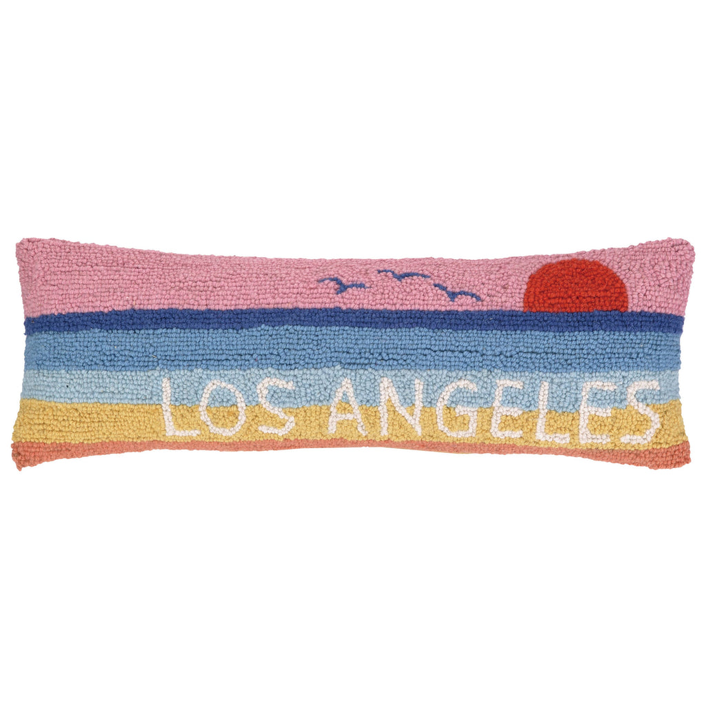 Los Angeles hook pillow with colorful sunset stripes and a bold "Los Angeles" text.