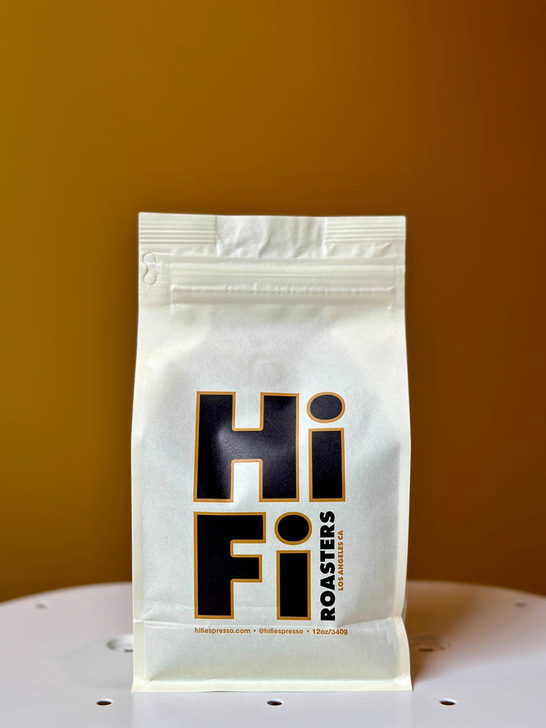 HiFi Roasters light/medium roast coffee bag, featuring bold black and gold logo on eco-friendly packaging, from the Uraga District of Guji, Ethiopia.