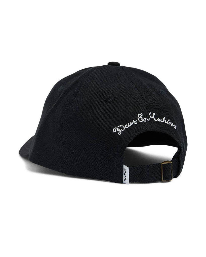 Black cap with white "Deus Customs" embroidery, curved brim, and adjustable fit.