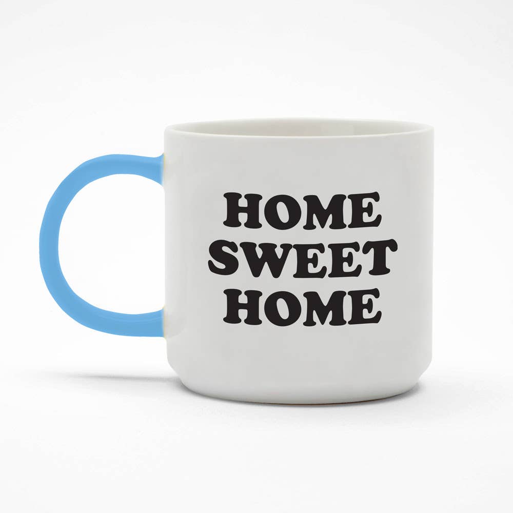 Ceramic mug with the phrase "Home Sweet Home" in bold black letters on a white background, paired with a light blue handle.