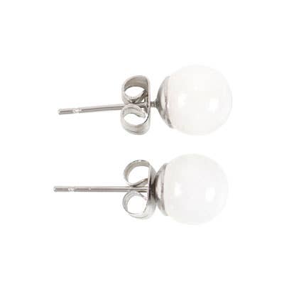 a pair of clear quartz crystal stud earrings on a matching backing card with sterling silver posts and butterfly backs.