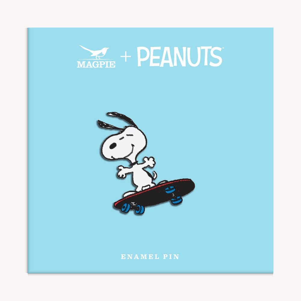 Enamel pin of Snoopy skateboarding with a joyful expression.