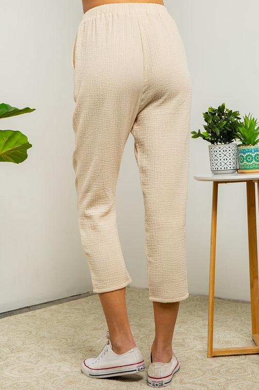 Sleek Lola Pants, reflecting a harmonious blend of timeless design and contemporary tailoring.