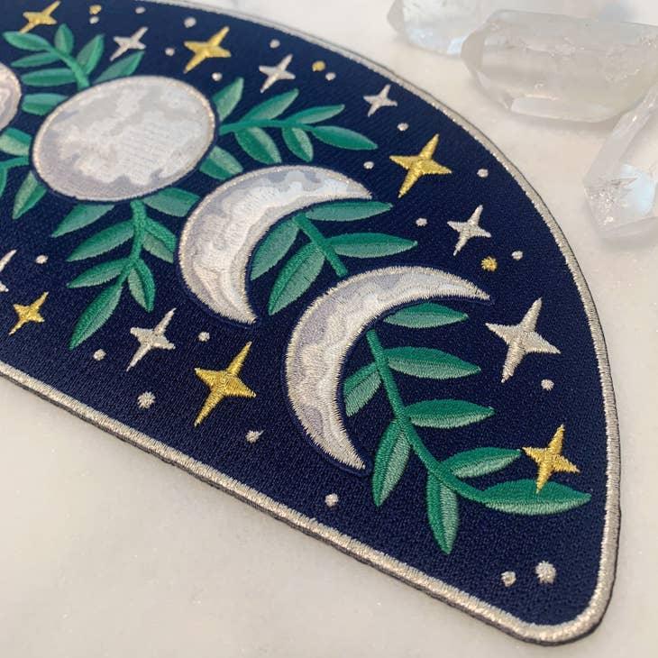 XLarge patch depicting detailed embroidery of the moon's various phases.