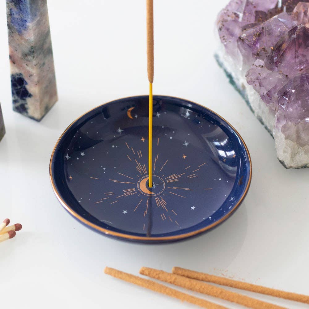 Starry Sky Incense Holder with gold accents and an incense stick.